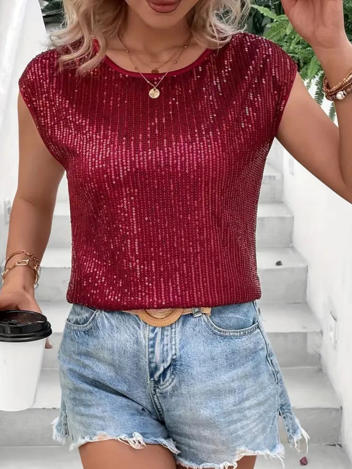 Women's glittery top with a relaxed fit, size