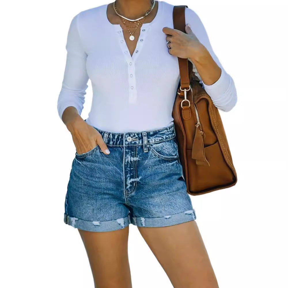 Women's distressed denim shorts with a high waist and frayed hem, size S