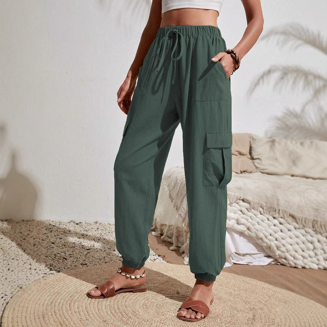 Women's cargo trousers with elasticated waistband and practical side pockets, size S