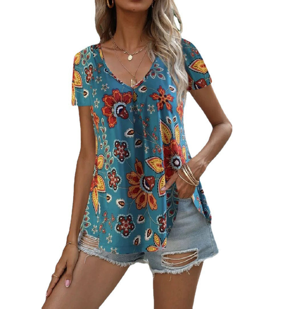 Women's floral top with deep V-neck and flowing cut, size