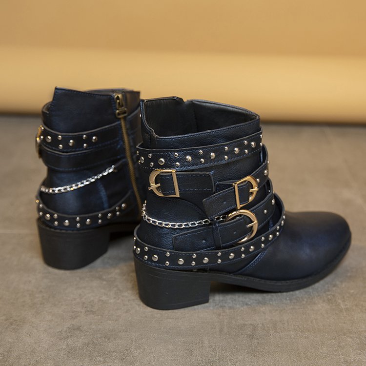 Women's ankle boots with a fashionable strap design and decorative accents, size S
