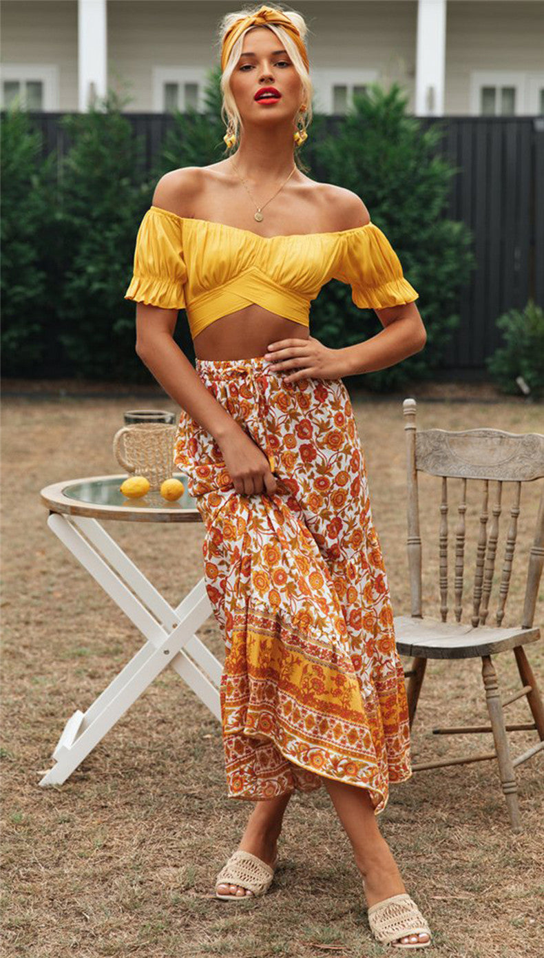Women's crop top with flowing puff sleeves and knee-length details, size S