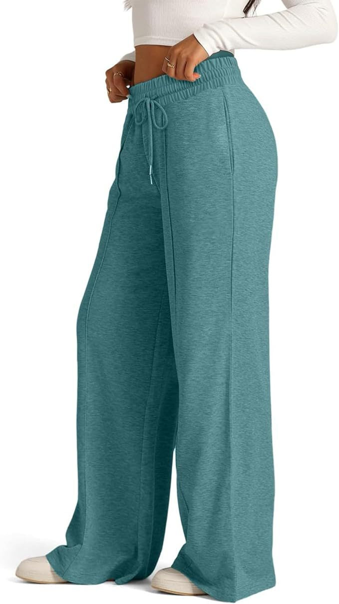 Women's comfortable and casual leisure trousers with elasticated waistband and side pockets, size