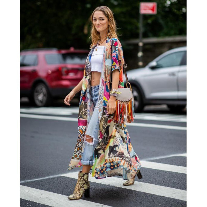 Women's kimono with colorful patchwork design and flowing fabric, size S