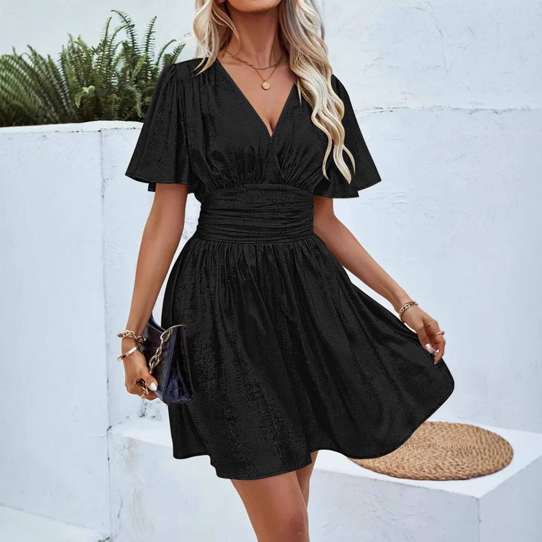 Women's evening dress with shimmering V-neck and voluminous sleeves, size S