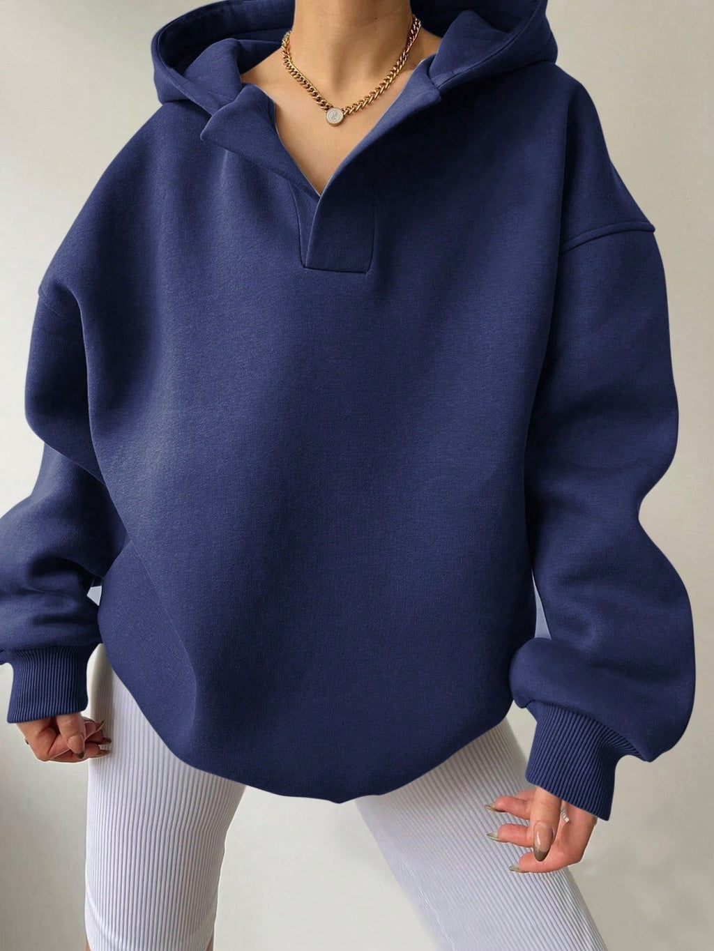 Women's oversized hoodie with a modern stand-up collar and soft materials, size S