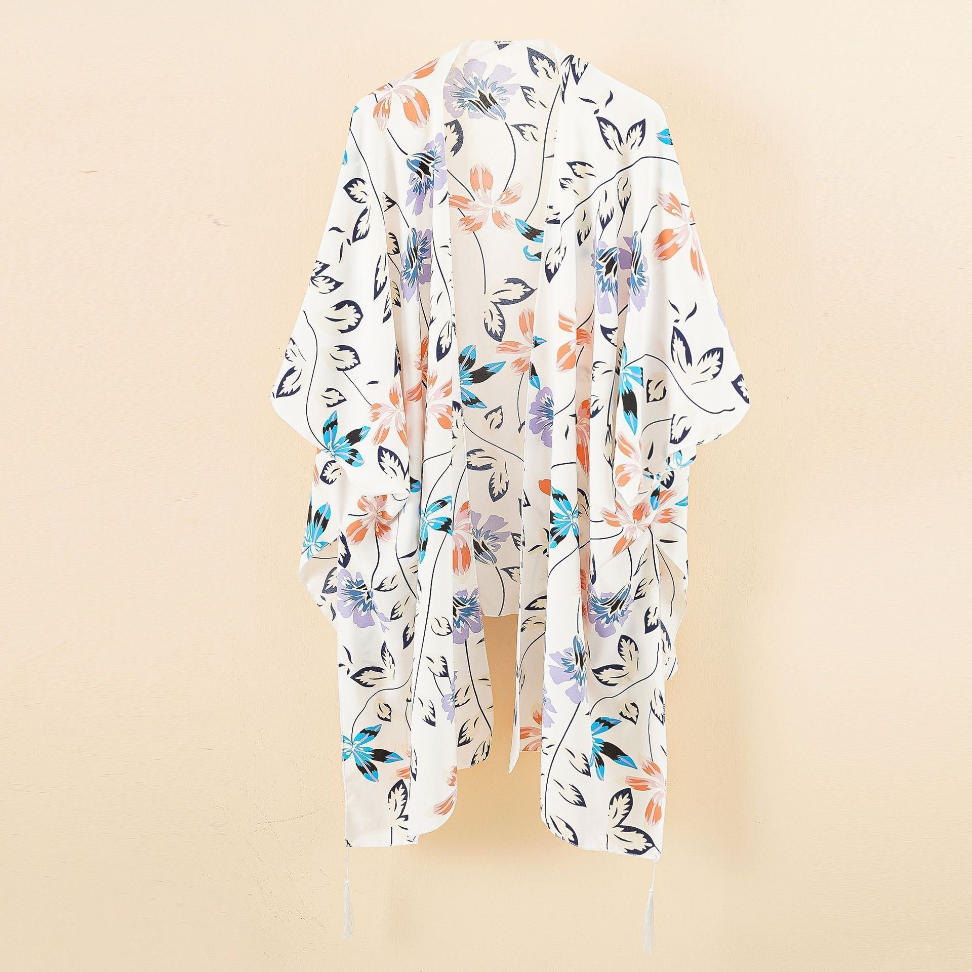 Women's chiffon kimono with floral design and fringed edges, size S
