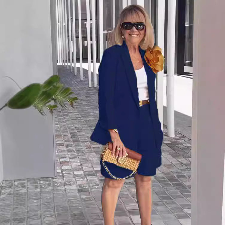 Women's elegant blazer and shorts ensemble with fashionable button detail and high-quality material, size S