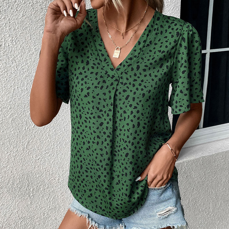 Women's short-sleeved blouse with a modern polka dot design and a relaxed fit, size [size missing]