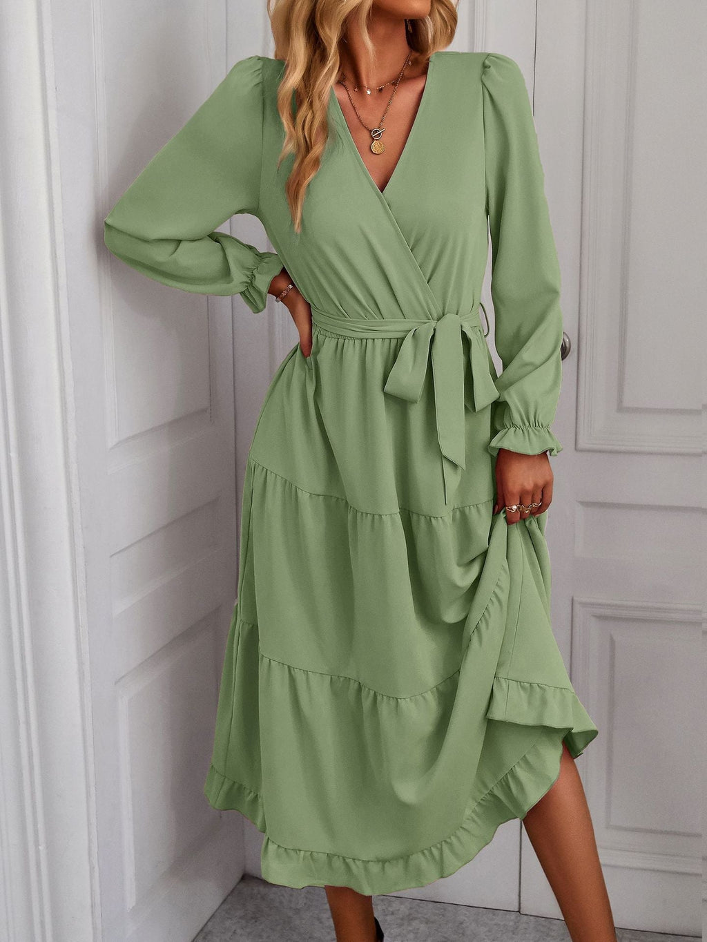 Women's wrap dress with ruffles and waist belt, size