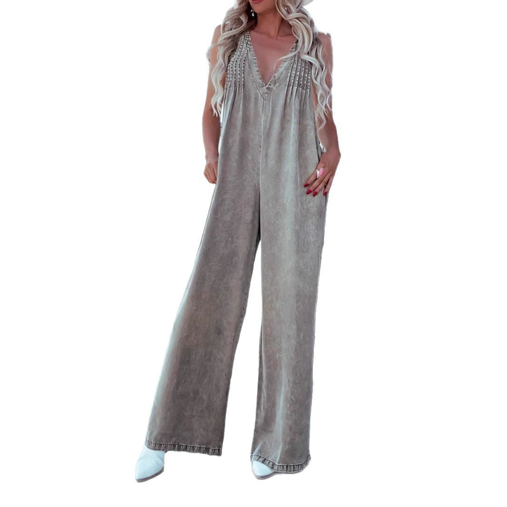 Women's jumpsuit with deep V-neck and practical pockets, size