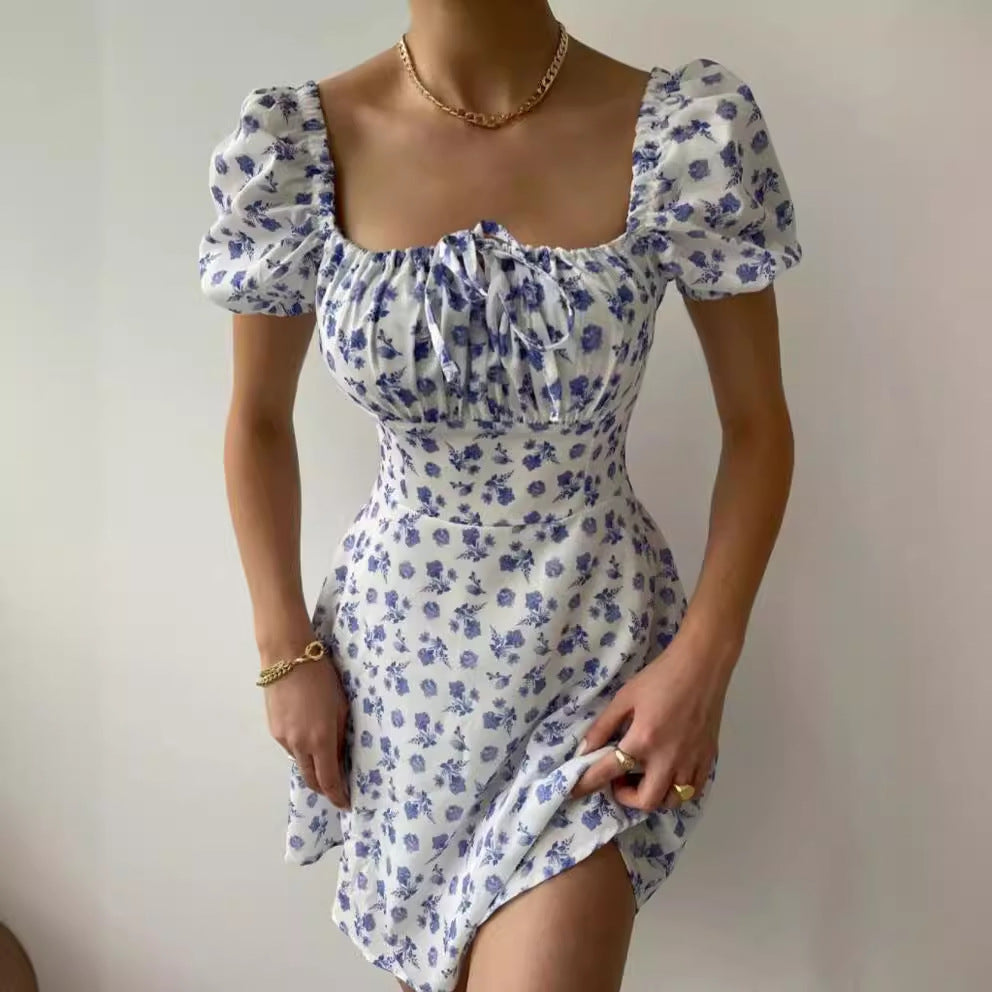Women's floral print mini dress with puff sleeves, size