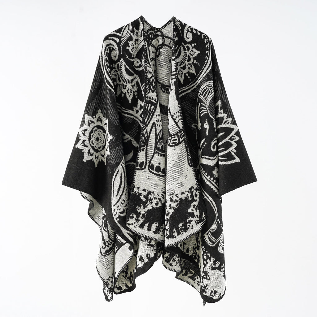 Women's elegant transitional poncho with an artistic floral pattern and fringed edges, size Valenzora