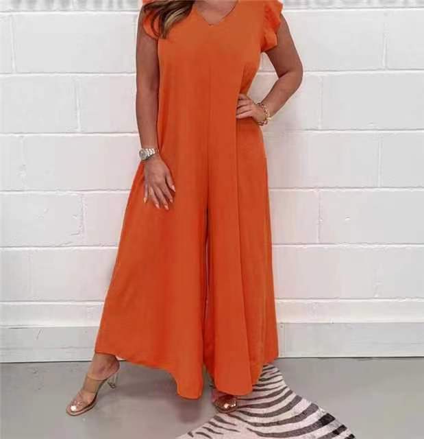 Women's upscale jumpsuit with voluminous ruffled sleeves and V-neck, size S