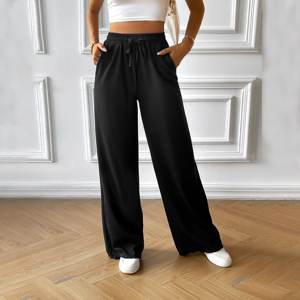 Women's wide-legged summer trousers with elasticated waistband and side pockets, size