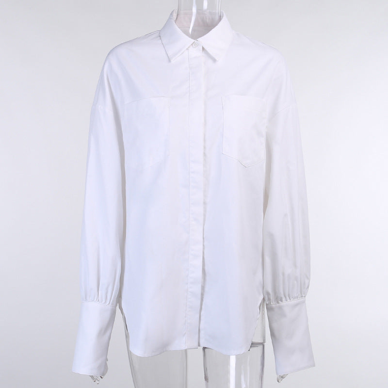 Women's shirt blouse with a stylish oversized cut and trendy puff sleeves, size [size]