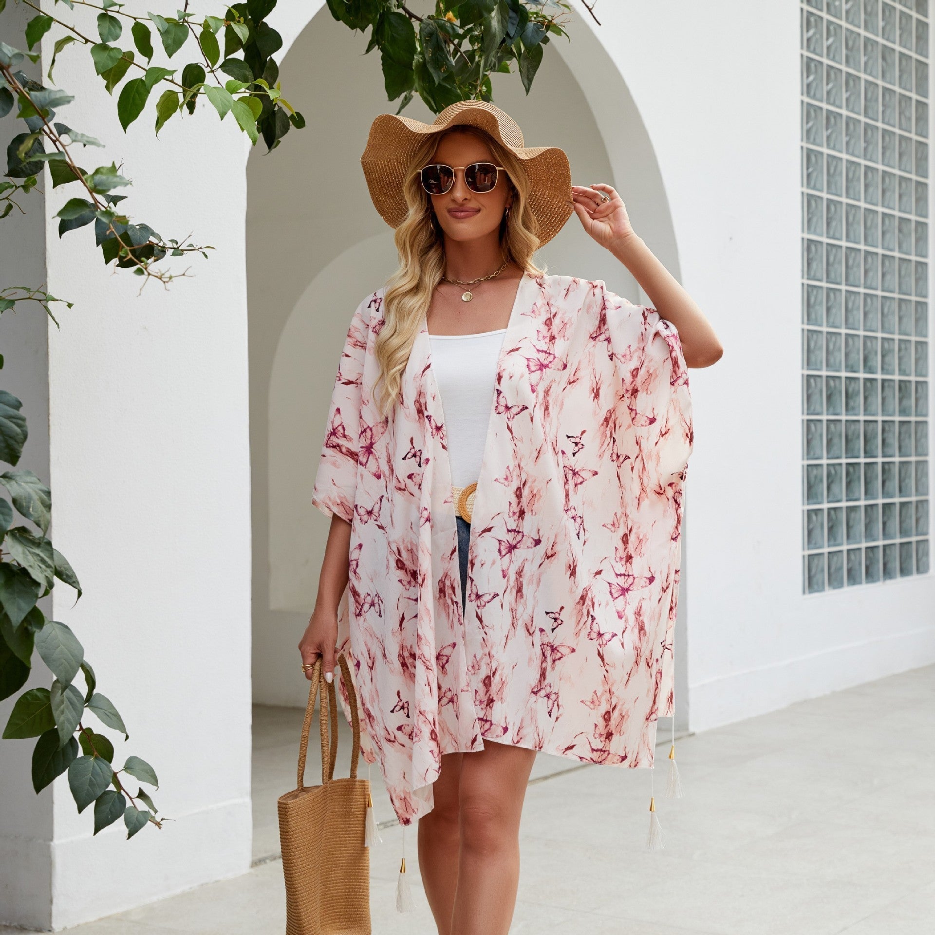 Women's elegant kimono with an artistic floral pattern and fringed edges, size Valenzora