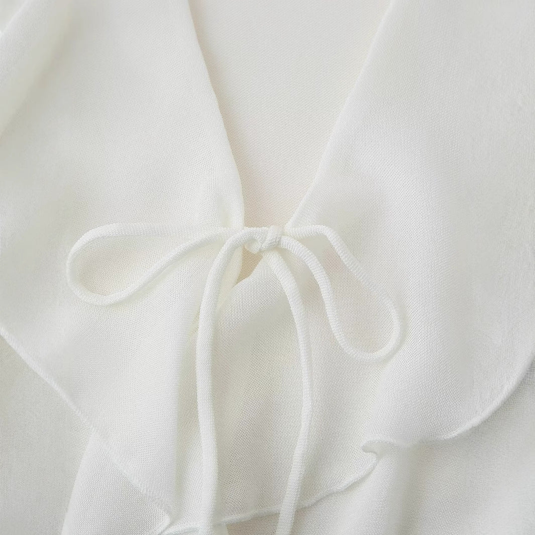 Women's blouse with romantic ruffles and deep V-neck, size
