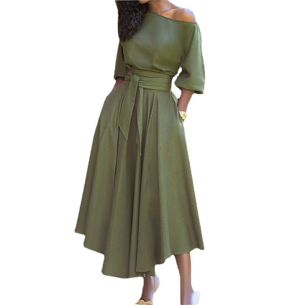 Women's elegant wrap dress with asymmetrical cut and practical pockets, size