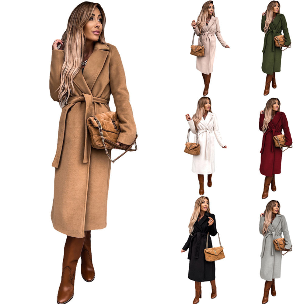 Women's elegant wool coat with tailored cut and belt, size S