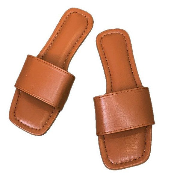 Women's open toe-post mules with an elegant design, size S