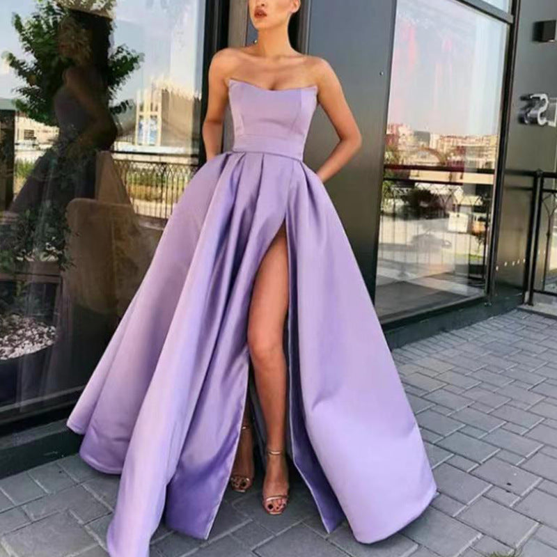 Women's elegant evening dress with deep slit and flowing skirt, size [size]