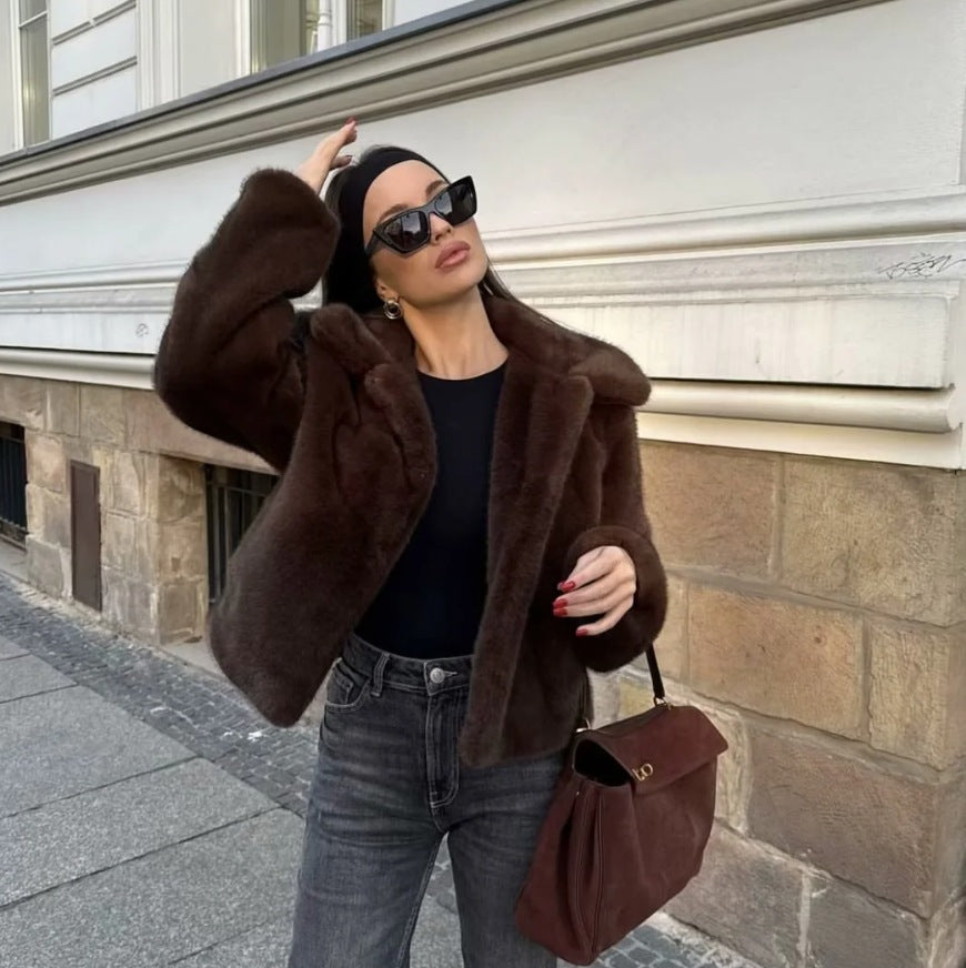 Women's faux fur jacket with classic collar and elegant silhouette, size S