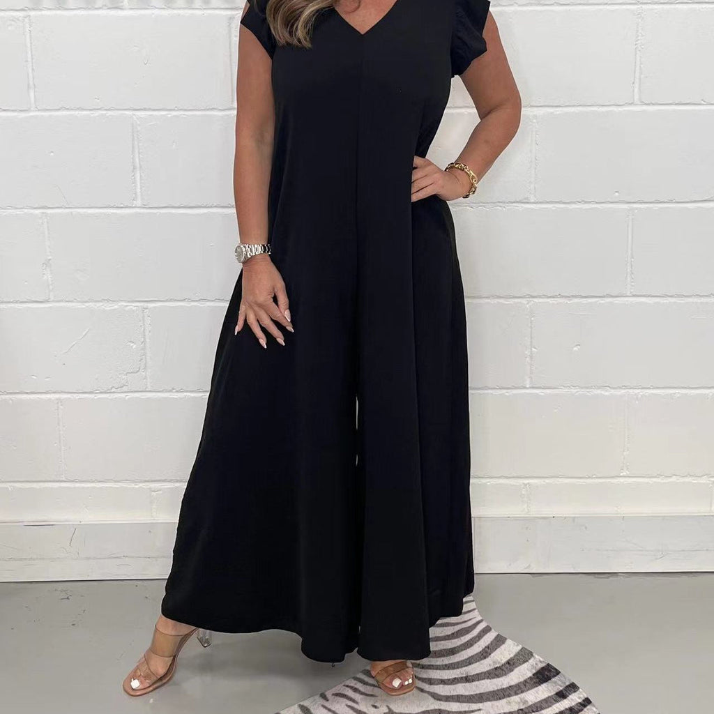Women's upscale jumpsuit with voluminous ruffled sleeves and V-neck, size S
