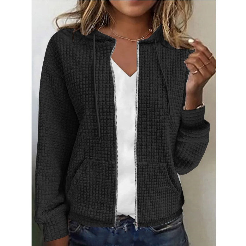 Women's waffle-textured hooded jacket with practical pockets and a modern cut, size S