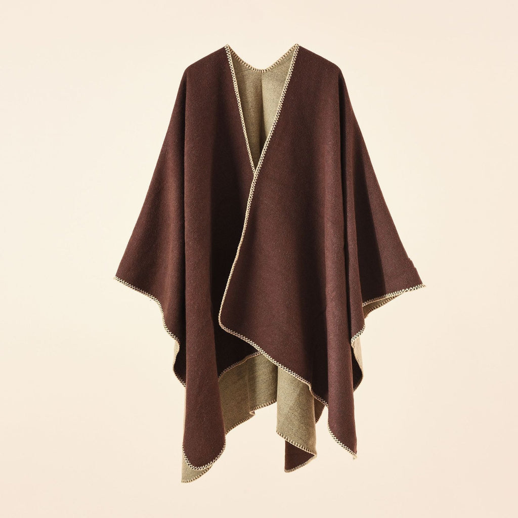 Women's knitted poncho with asymmetrical cut and high warmth retention, size
