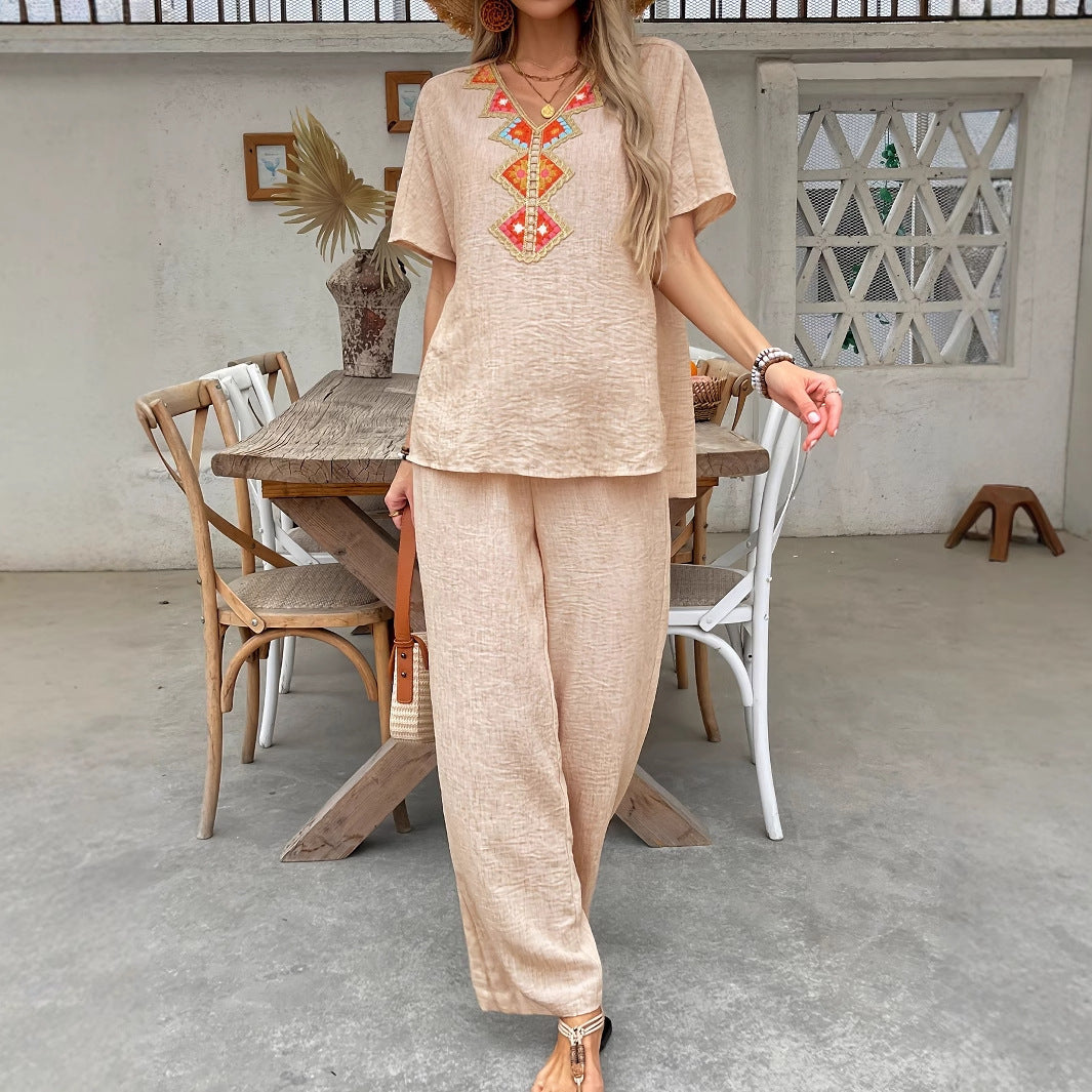 Women's lightweight, airy trouser suit with artistic embroidery, size [size]