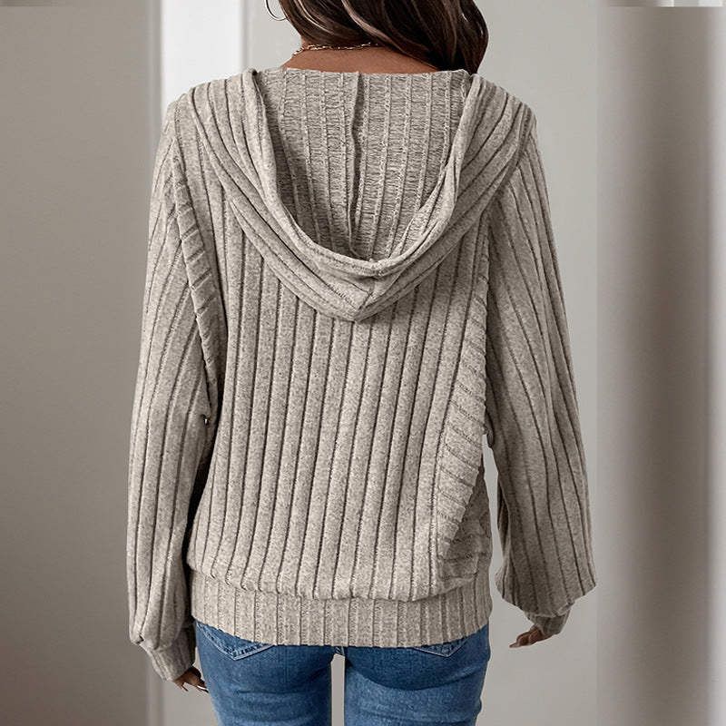 Women's hooded sweater with structured rib design and elegant button details, size S