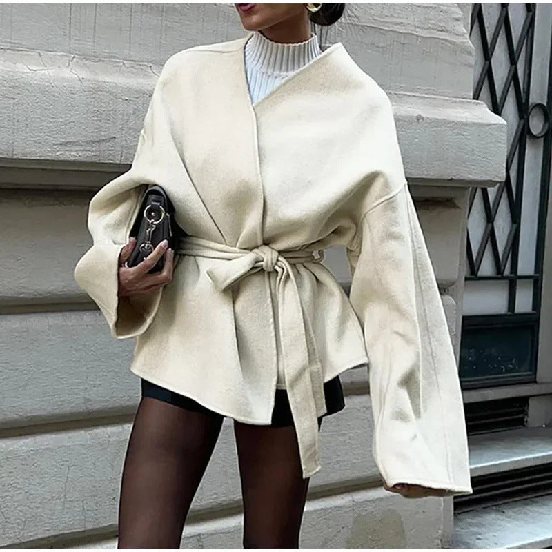 Women's elegant wrap jacket with waist belt, size
