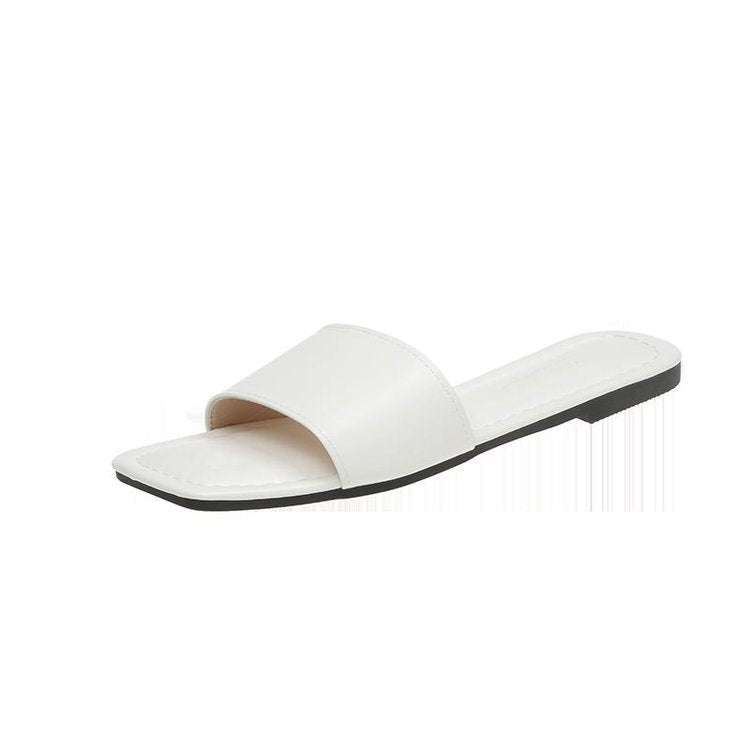 Women's open toe-post mules with an elegant design, size S