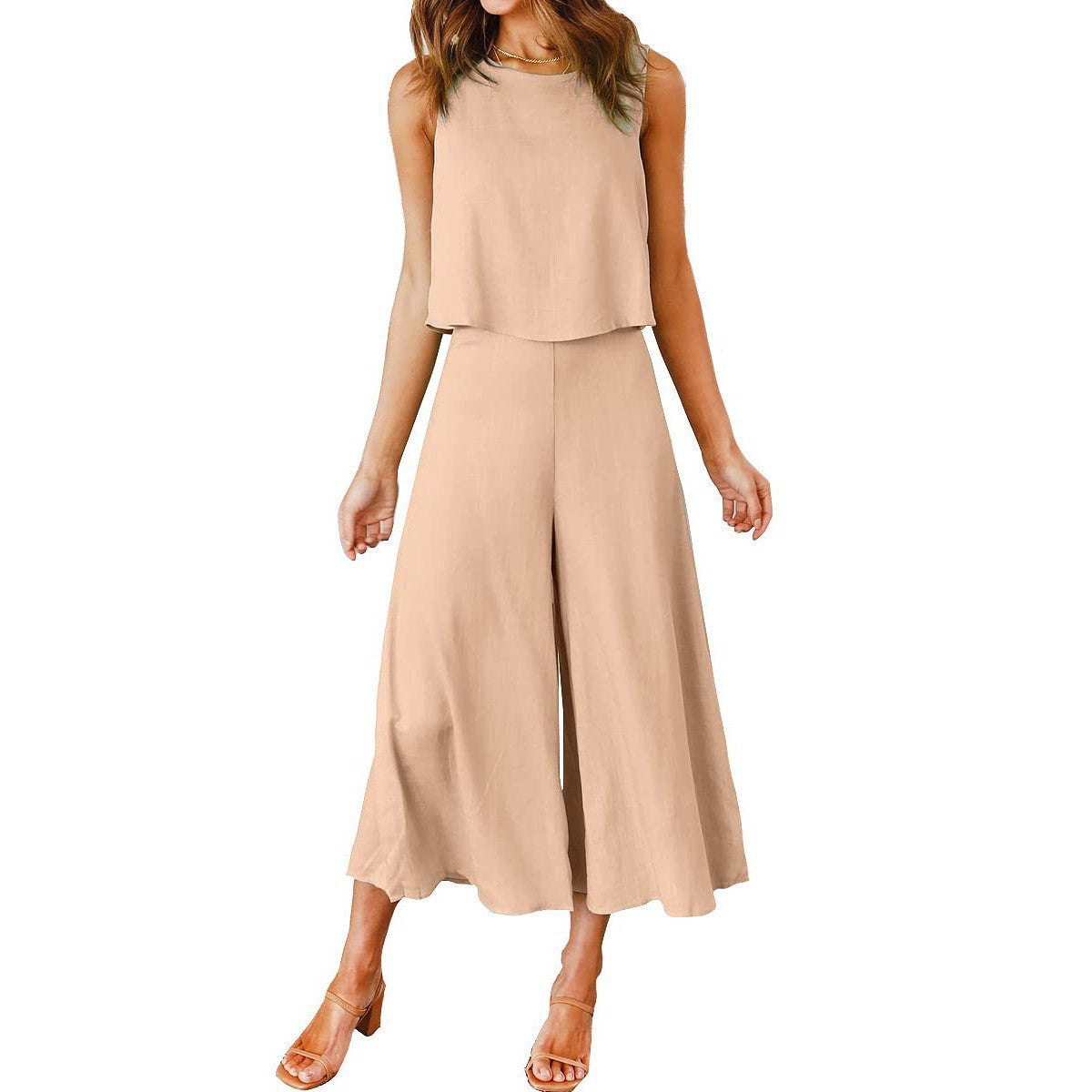 Women's airy jumpsuit with flared leg and sleeveless design, size S