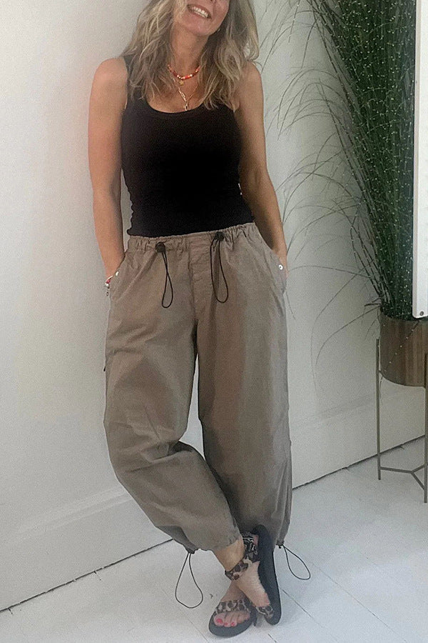 Women's casual pleated trousers made of breathable material, size S
