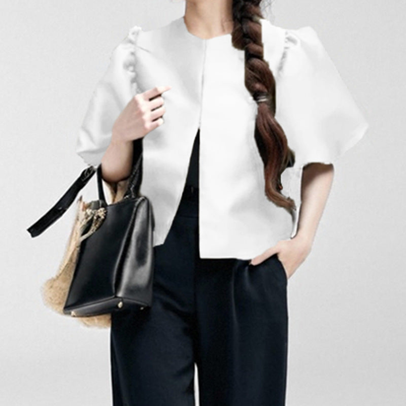 Women's blouse with voluminous puff sleeves and modern design, size S