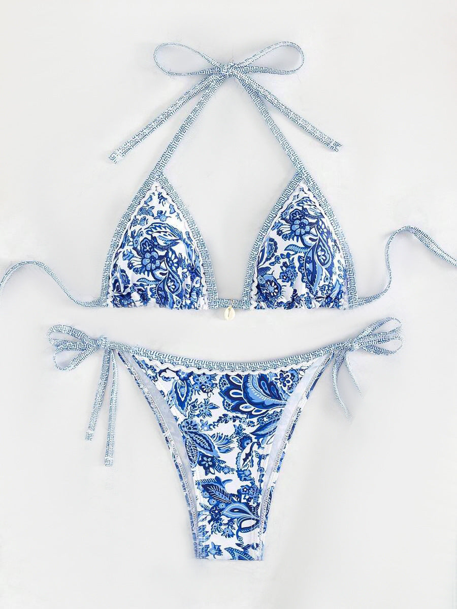 Women's triangle bikini set with playful floral pattern and adjustable ties, size [size]