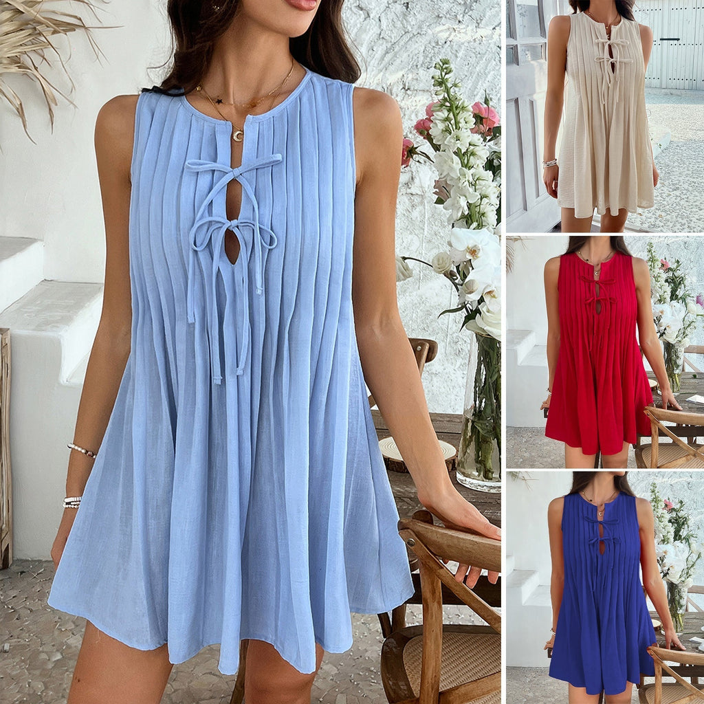 Women's short sleeveless dress with ruching and decorative keyhole neckline, size S