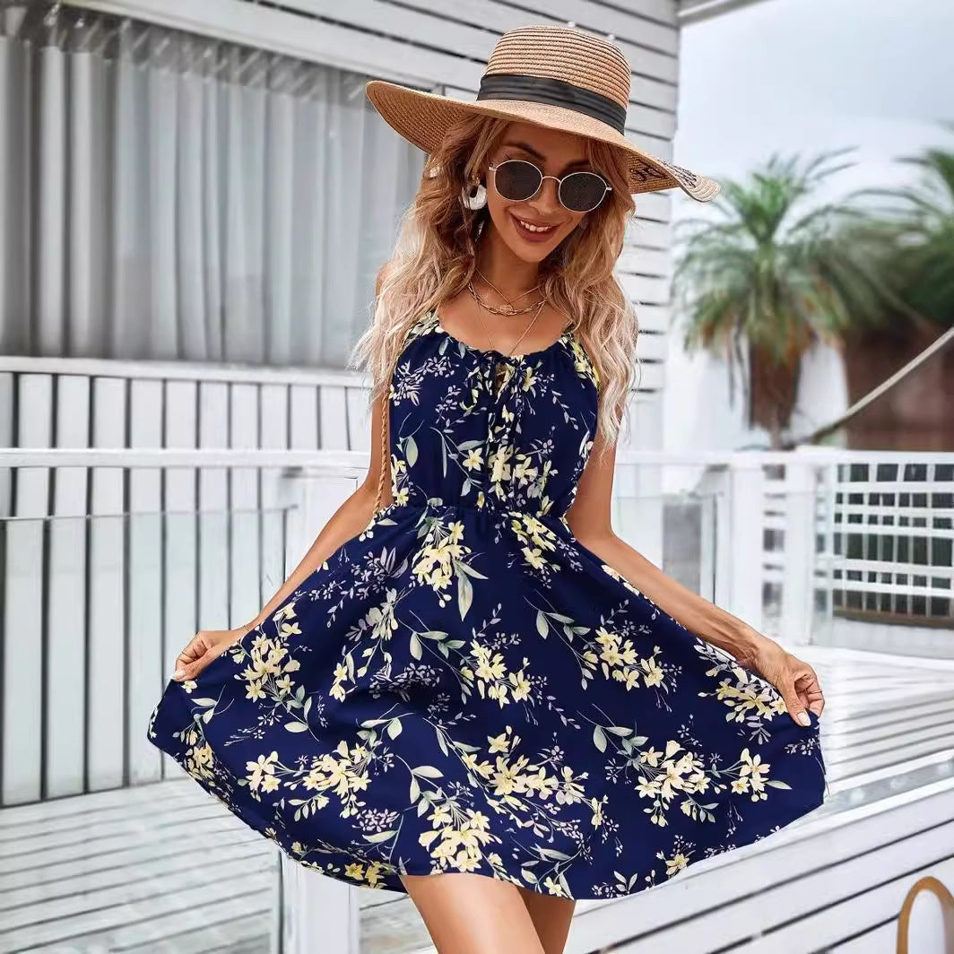Women's floral dress with adjustable spaghetti straps and elastic waistband, size [size missing]