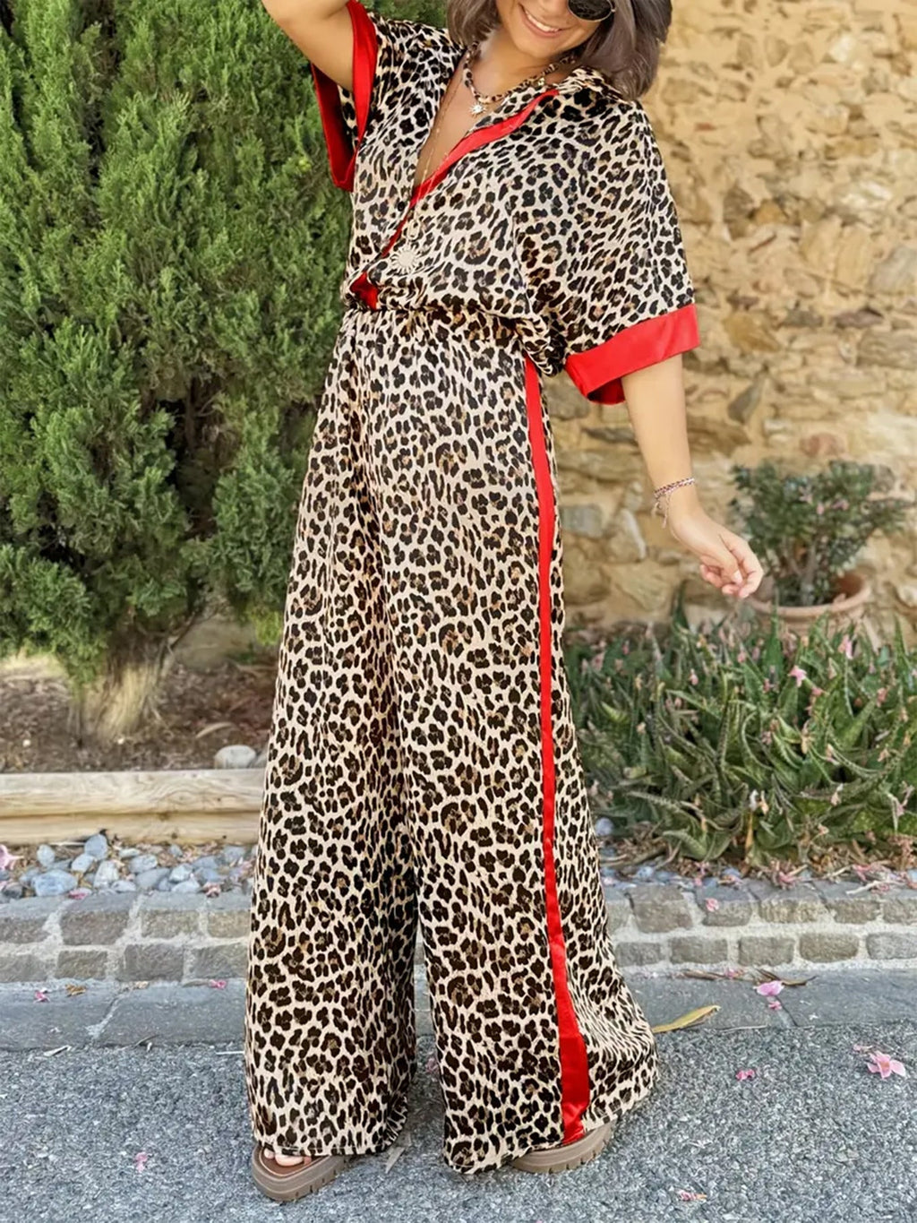 Women's elegant and comfortable linen jumpsuit with leopard print and contrast stripes, size S