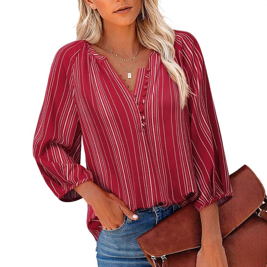 Women's elegant tunic blouse with sophisticated stripes, size