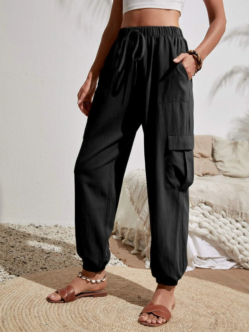 Women's cargo trousers with elasticated waistband and practical side pockets, size S
