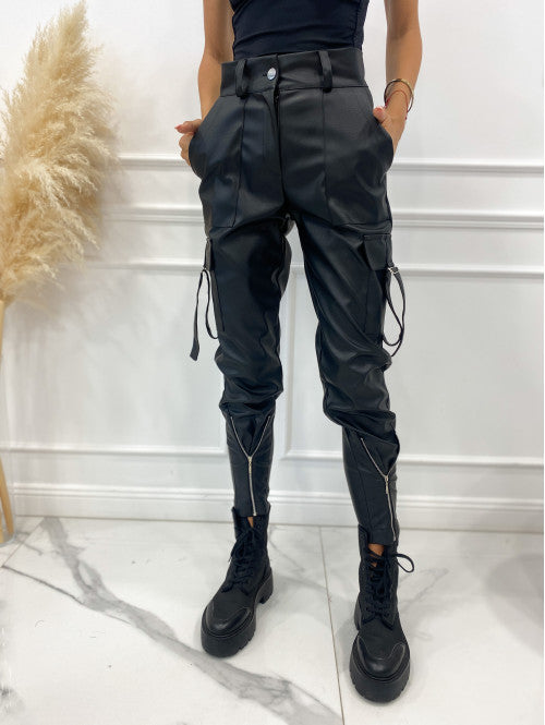 Women's waterproof faux leather cargo pants with zippers and adjustable cuffs, size