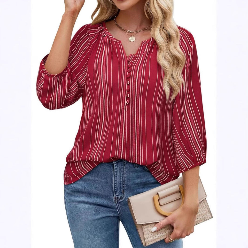 Women's elegant tunic blouse with sophisticated stripes, size