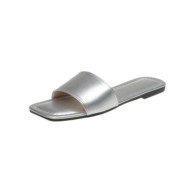 Women's open toe-post mules with an elegant design, size S