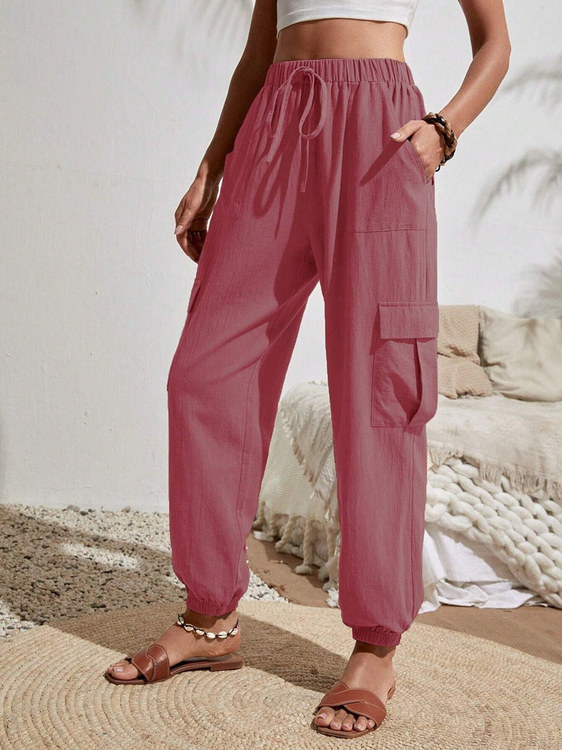 Women's cargo trousers with elasticated waistband and practical side pockets, size S