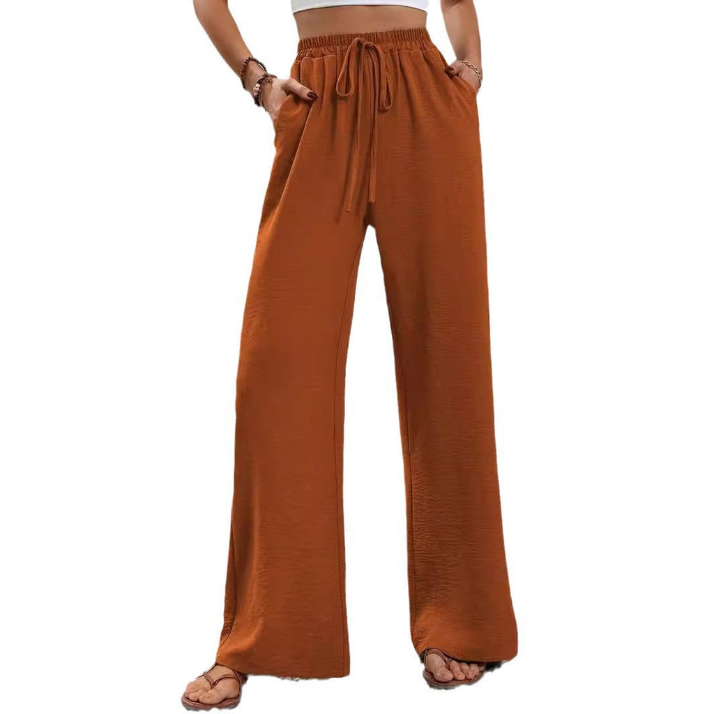 Women's casual, wide-legged leisure trousers with elasticated waistband and side pockets, size S