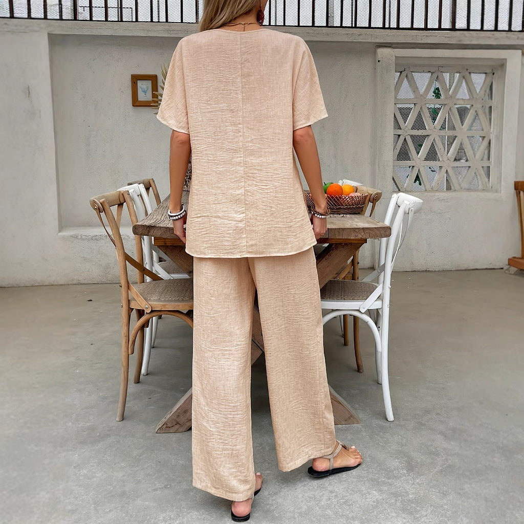 Women's lightweight, airy trouser suit with artistic embroidery, size [size]
