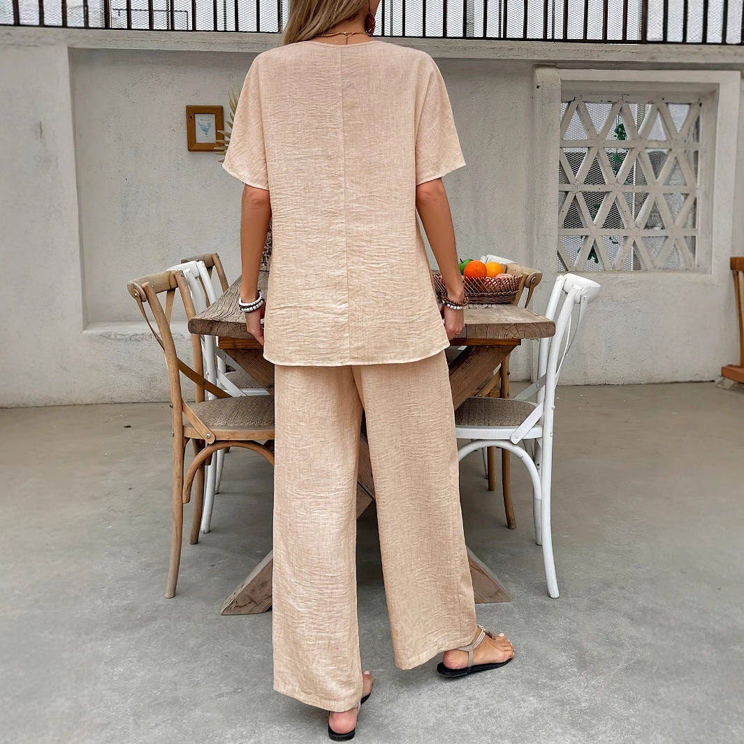 Women's lightweight, airy trouser suit with artistic embroidery, size [size]